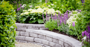 landscaped garden with stone wall