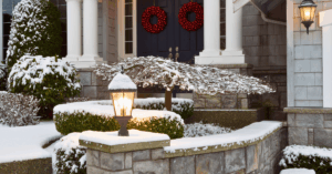 home in winter that has had to winterize it's landscaping