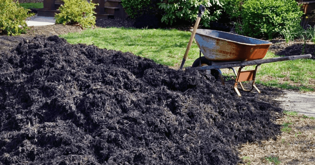 mound of mulch delivered by a landscaping supplier