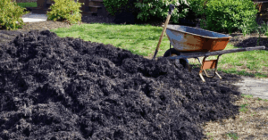 mound of mulch delivered by a landscaping supplier
