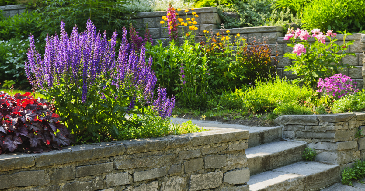 landscaping stones being used as walls for a garden