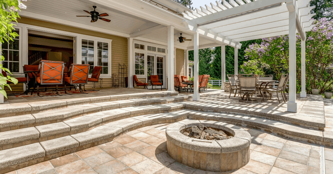 large outdoor patio with beautiful stone hardscaping