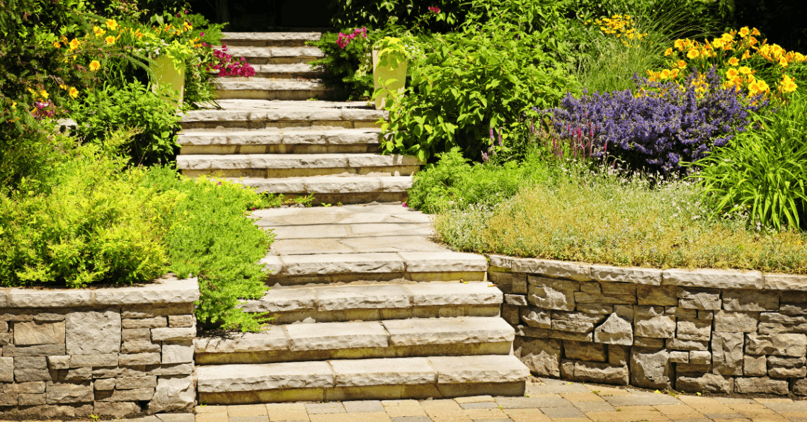 stone staircase and stone walls with beautiful landscaping